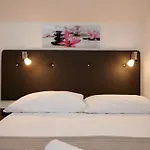 & Zaja *